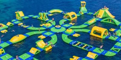 Water Parks with Floating Obstacle Courses and Slides for Family Fun
